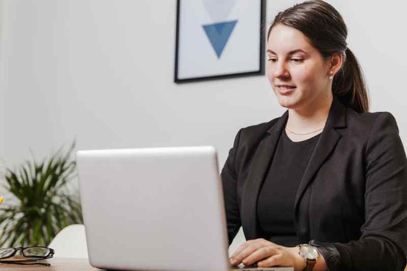 Smiling Woman Laptop Office